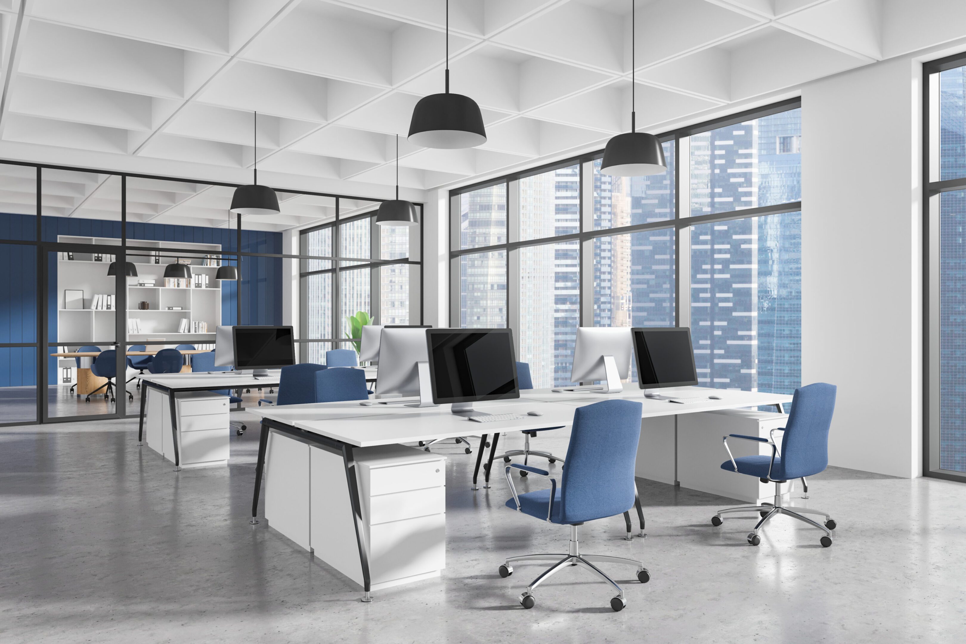 Modern office with blue chairs and desks.